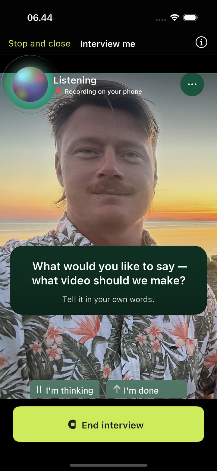 Interview me: the AI asks “What would you like to say — what video should we make?” while the camera records